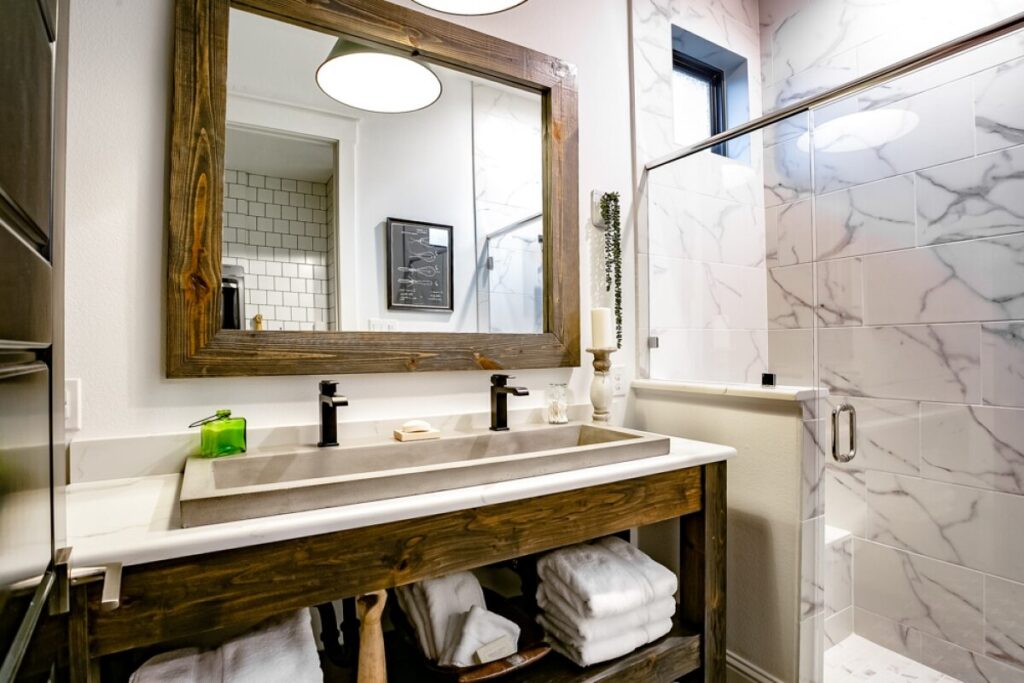 farmhouse vanity concrete sink marble tile mckinney tx.jpg | The Design House